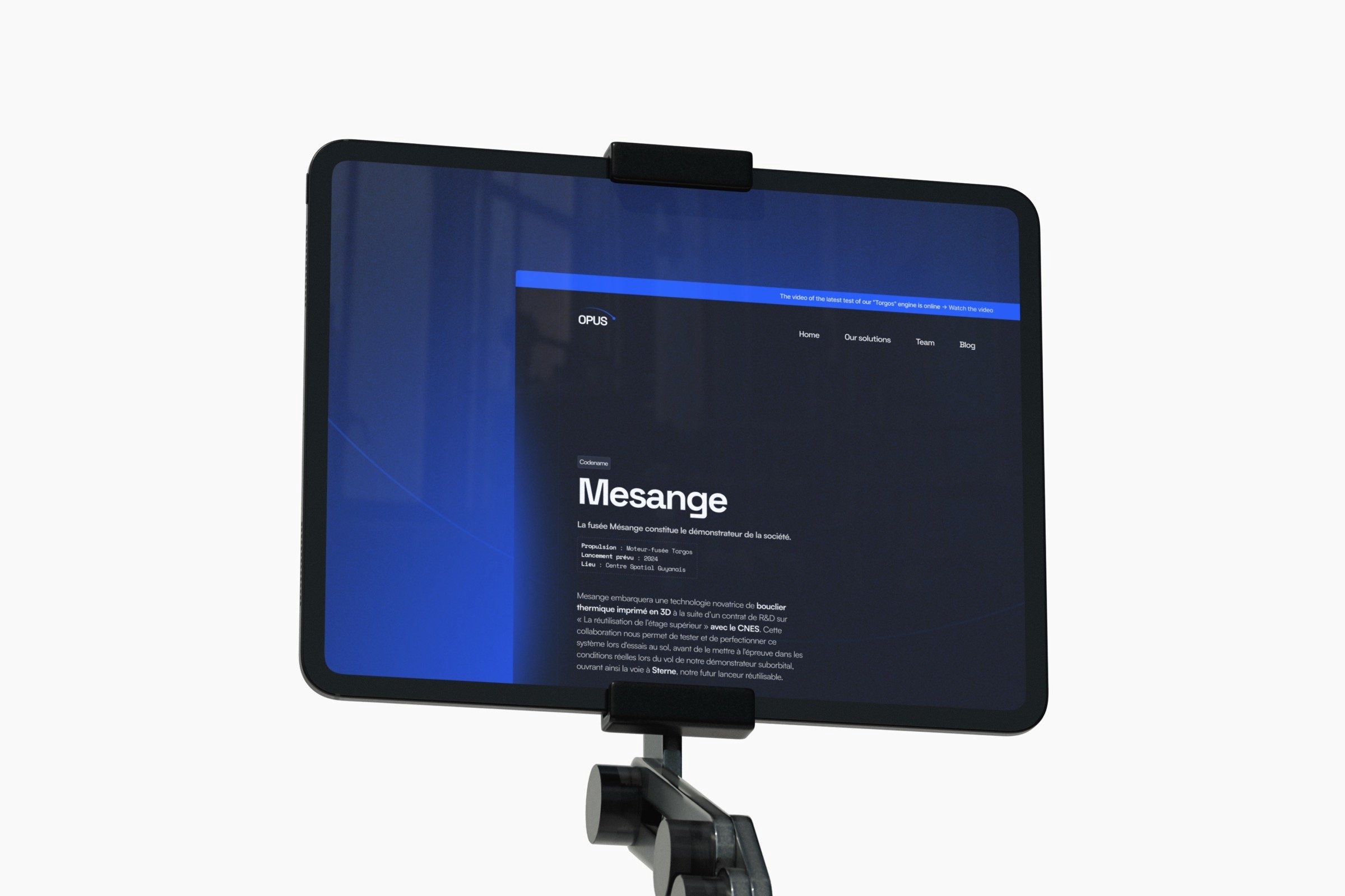 Opus Aerospace site on a mounted tablet — the Mesange launch demonstrator page with its propulsion and launch-site specifications.